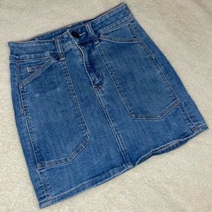 American Eagle Next Level Stretch mini high-waisted jean skirt.